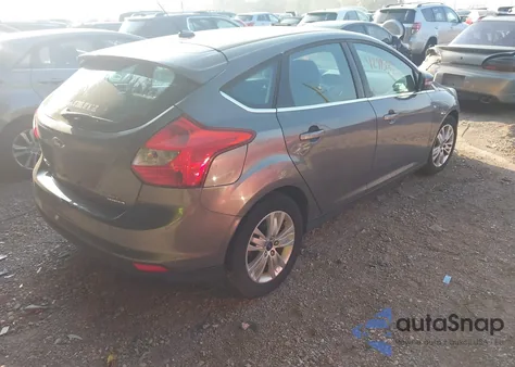 2012 Ford Focus Sel z USA, uszkodzony, nr VIN 1FAHP3M25CL465183